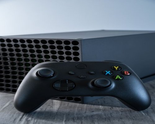 Modern gaming console and wireless controller exhibition
